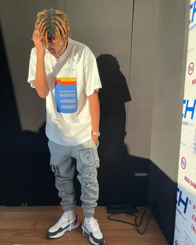 Cordae outfit in Pyer Moss, Hypland, and Puma, 2021
