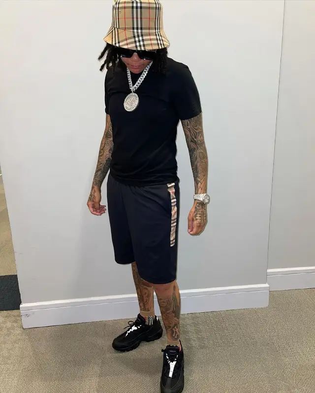 Young M.A outfit in Nike, Louis Vuitton, and Burberry, 2021
