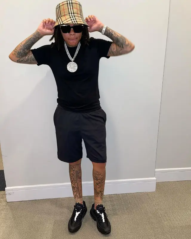 Young M.A outfit in Nike, Louis Vuitton, and Burberry, 2021