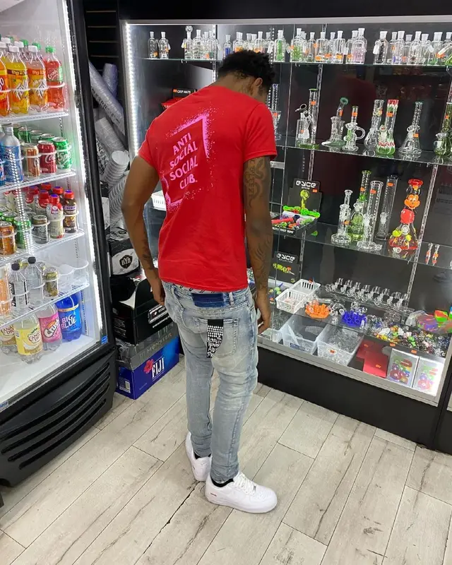 Lil Eazzyy outfit in Anti Social Social Club, Ksubi, and Supreme, 2021