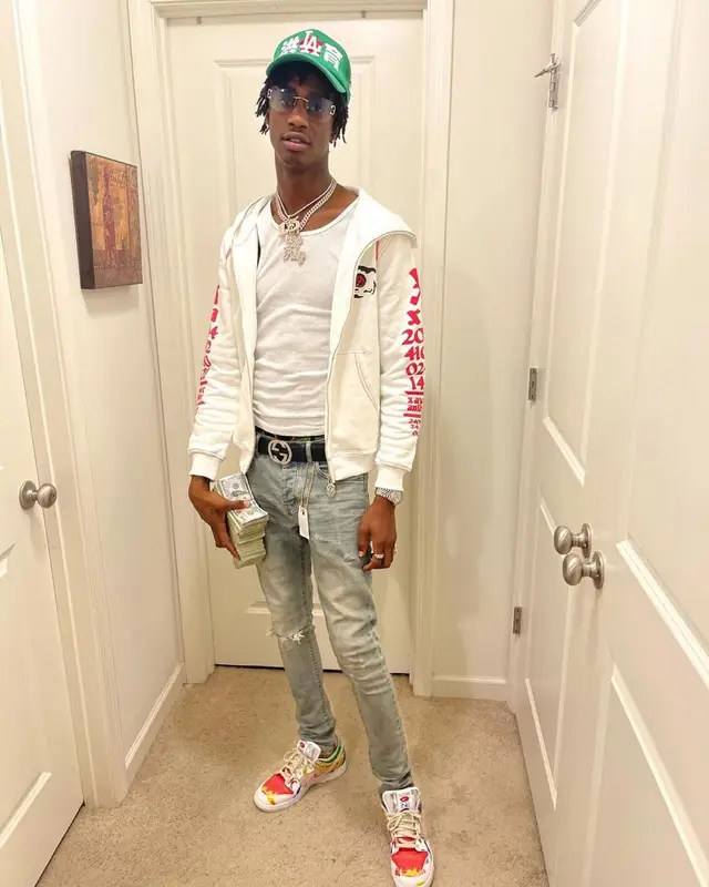 Yung Mal outfit in Purple Brand, Gucci, and Cartier, 2021