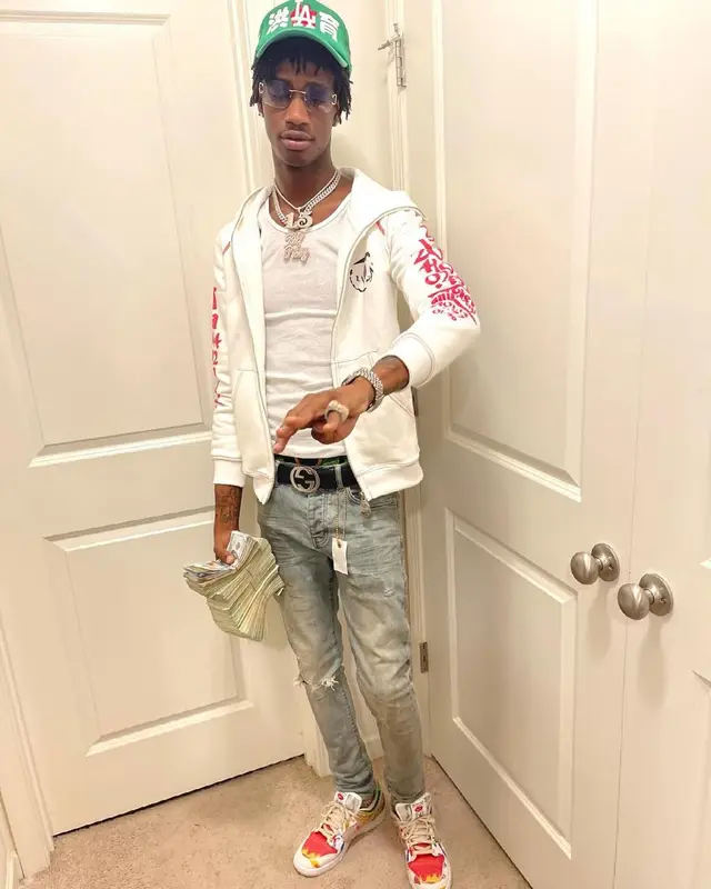 Yung Mal outfit in Purple Brand, Gucci, and Cartier, 2021