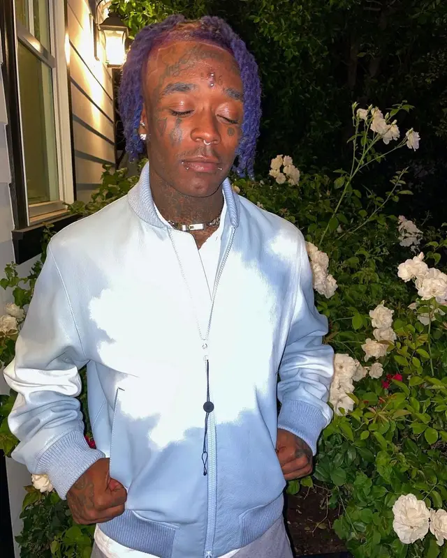 Lil Uzi Vert outfit in Louis Vuitton, Reebok, and Maison Margiela, 2021