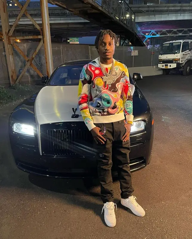Lil Tjay outfit in Dior, Kenny Scharf, and Nike, 2021