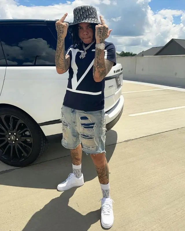 Young M.A outfit in Valentino, Represent, and Dior, 2021