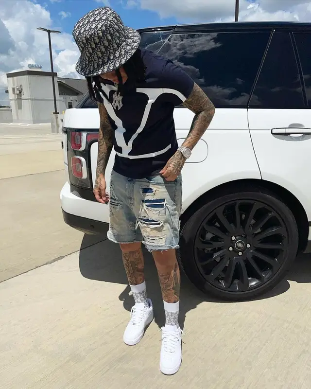 Young M.A outfit in Valentino, Represent, and Dior, 2021