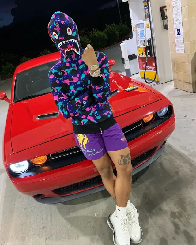 Mikey outfit in Vlone, Bape, and Pop Smoke Merch, 2021