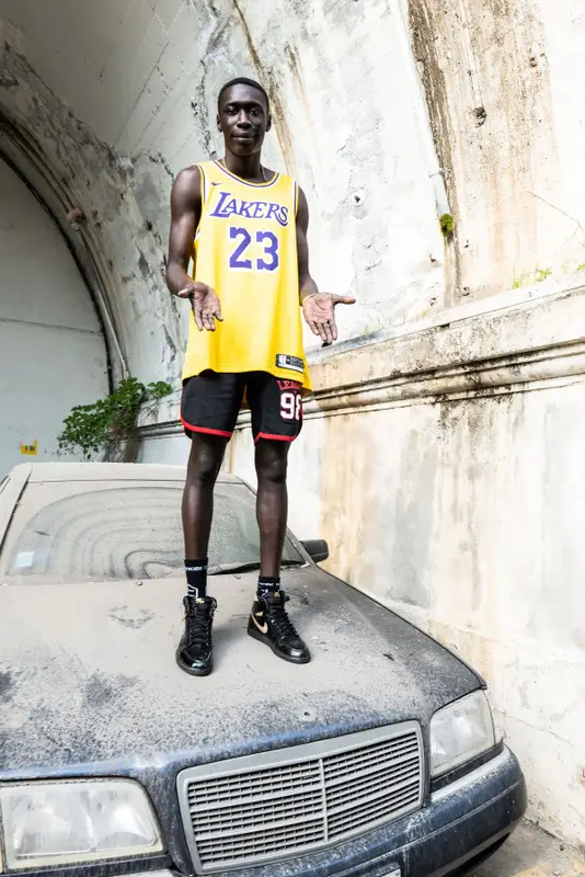 Khaby Lame outfit in Nike, Los Angeles Lakers, and Dolly Noire, 2021