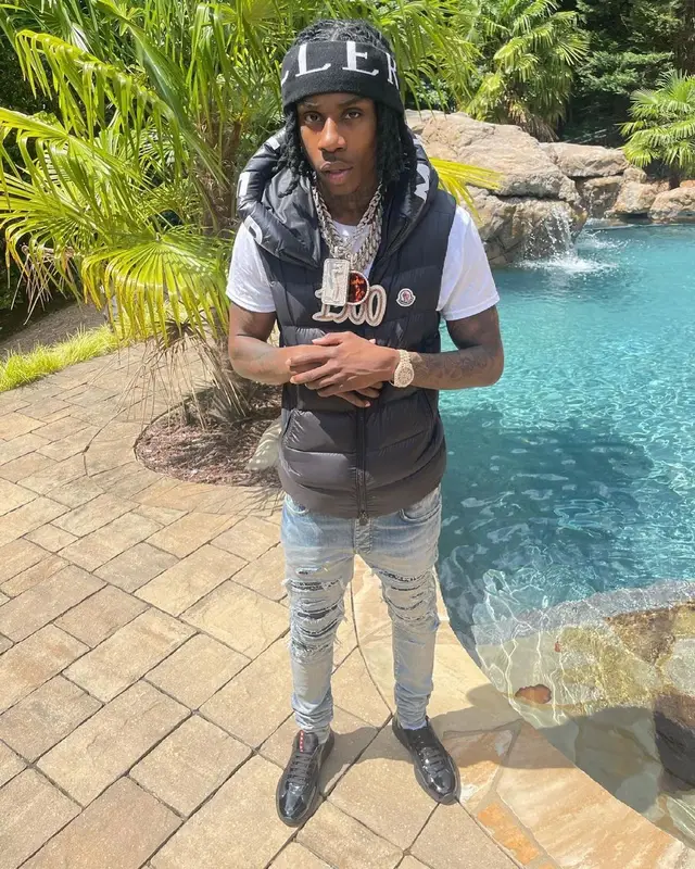 Polo G outfit in Amiri, Prada, and Moncler, 2021