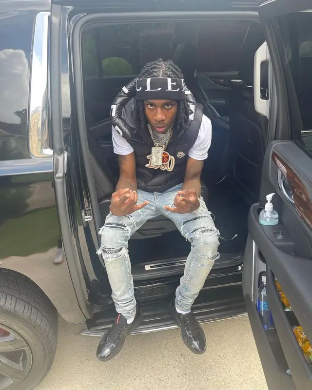 Polo G outfit in Amiri, Prada, and Moncler, 2021