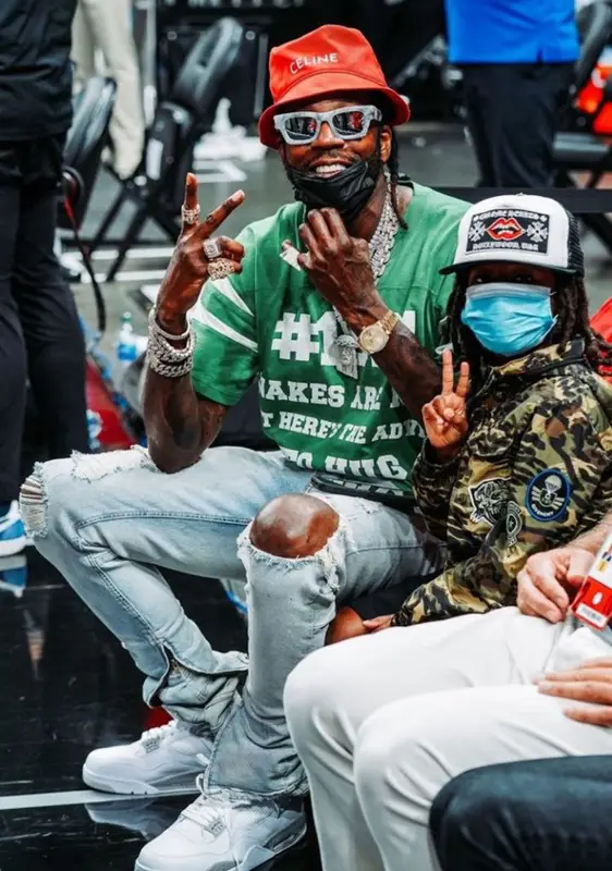 2 Chainz outfit in Gucci, Louis Vuitton, and Celine, 2021