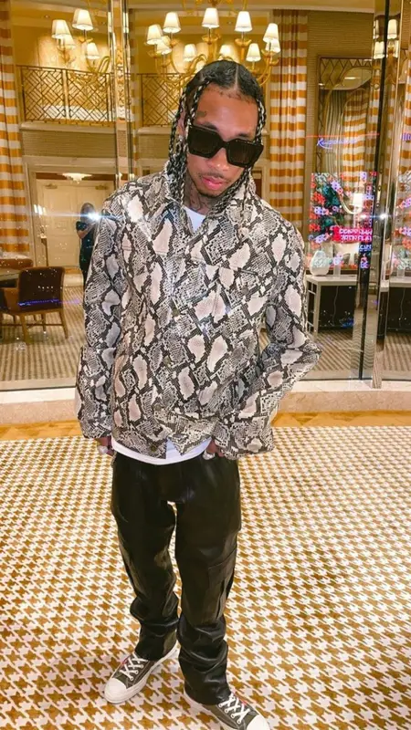 Tyga outfit in Converse, Off-White, and Comme Des Garcons, 2021
