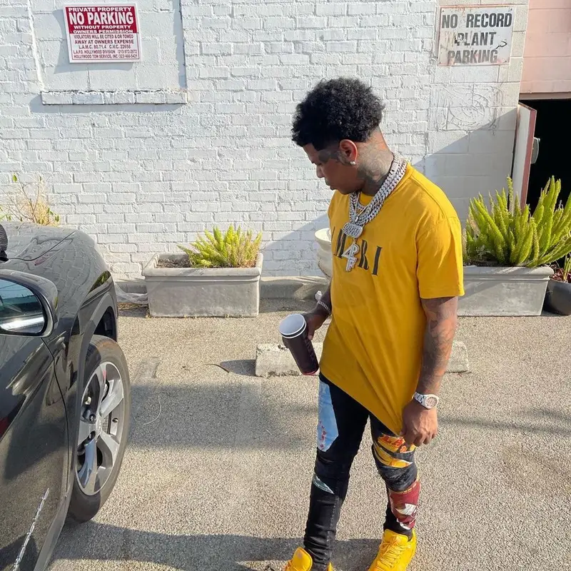 Rylo Rodriguez outfit in Playboy, Dior, and Amiri, 2021