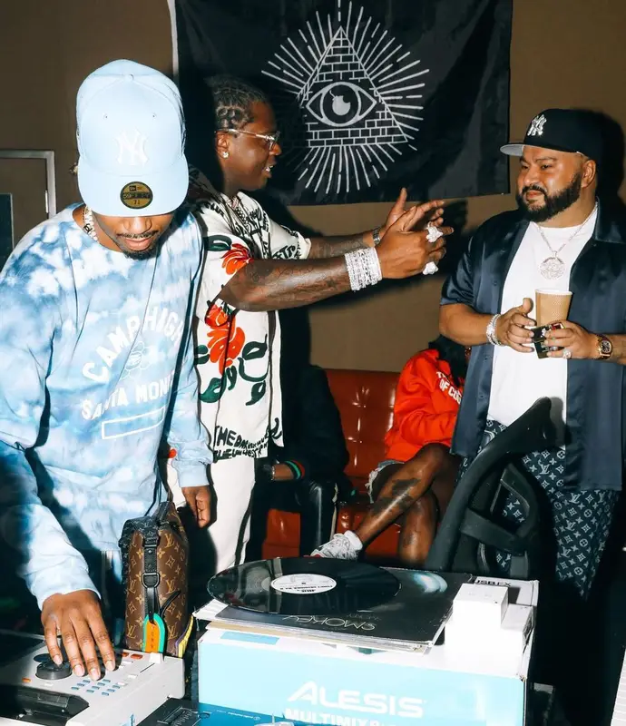 Metro Boomin outfit in Camp High, Louis Vuitton, and New Era, 2021