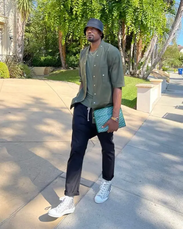 Serge Ibaka outfit in Rick Owens, Goyard, and Prada, 2021