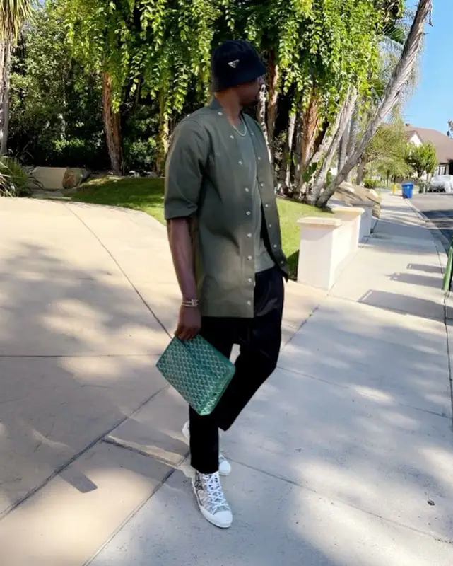 Serge Ibaka outfit in Rick Owens, Goyard, and Prada, 2021
