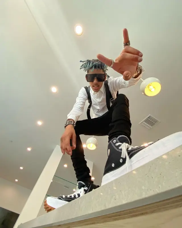 TheHxliday outfit in Saint Laurent, Converse, and Louis Vuitton, 2021