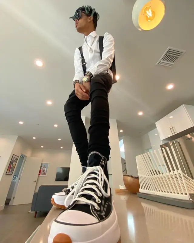 TheHxliday outfit in Saint Laurent, Converse, and Louis Vuitton, 2021