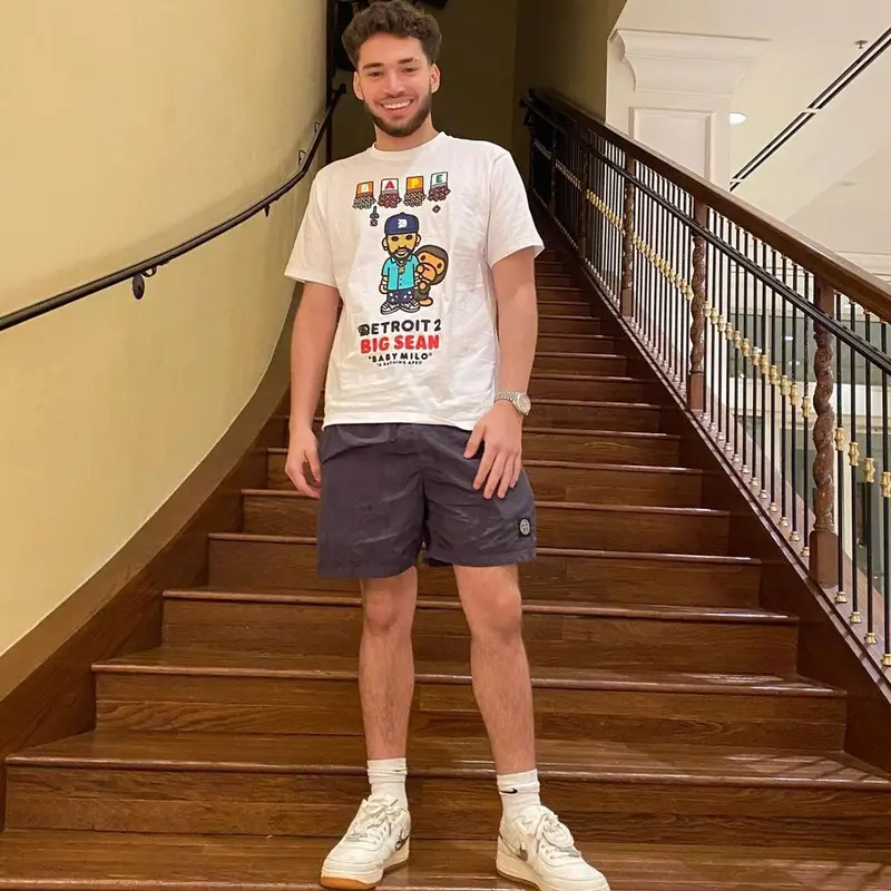 Adin Ross outfit in Bape, Big Sean Merch, and Stone Island, 2021