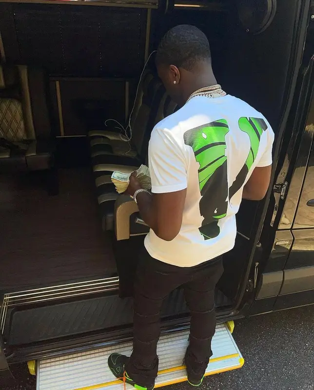 Bankroll Freddie outfit in Vlone, Valabasas, and Juice Wrld Merch, 2021