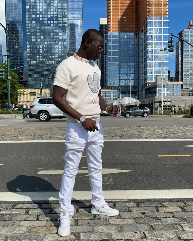 Bobby Shmurda outfit in Dior, Louis Vuitton, and Cartier, 2021
