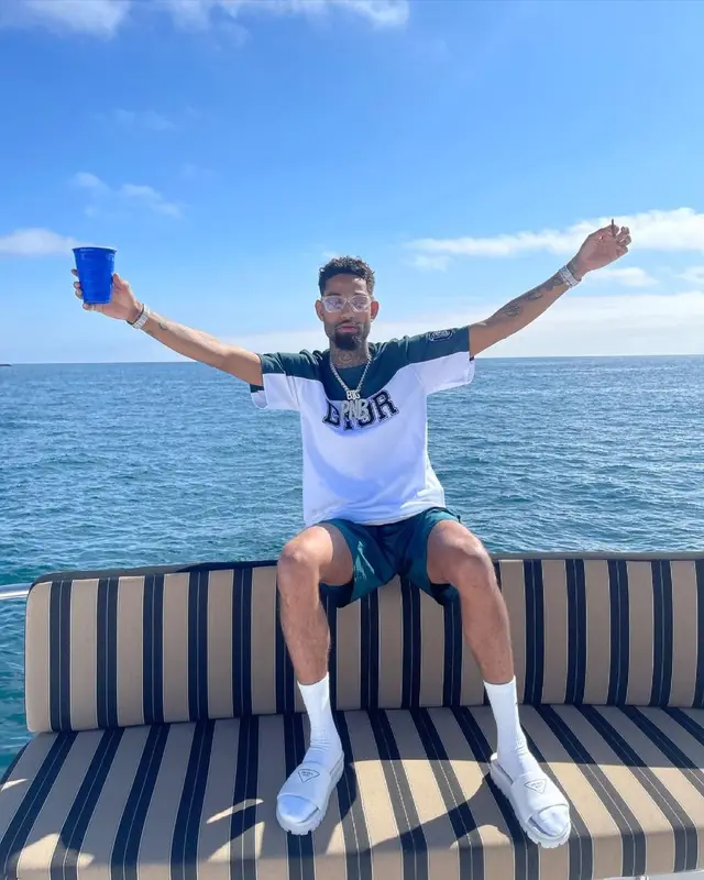 PnB Rock outfit in Dior, Chrome Hearts, and Prada, 2021