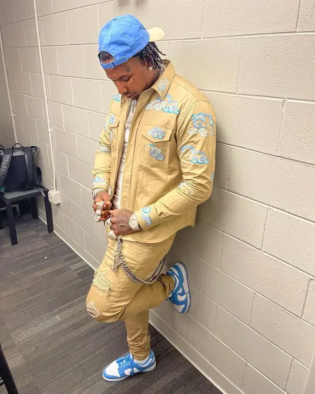 Moneybagg Yo outfit in Lanvin, Cartier, and Supreme, 2021