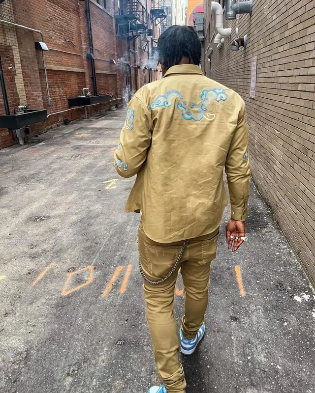 Moneybagg Yo outfit in Lanvin, Cartier, and Supreme, 2021