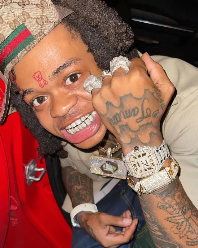 SpotemGottem outfit in Dickies, Cartier, and Gucci, 2021