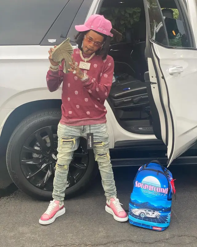SpotemGottem outfit in Alexander McQueen, Sprayground, and Cartier, 2021