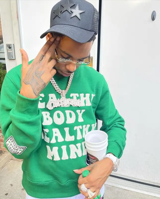Key Glock outfit in Chemist, Cartier, and Amiri, 2021