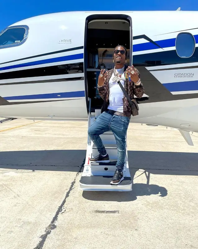 CJ So Cool outfit in NBA, Amiri, and Louis Vuitton, 2021