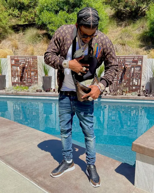 CJ So Cool outfit in NBA, Amiri, and Louis Vuitton, 2021