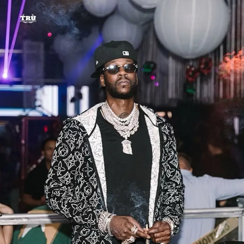 2 Chainz outfit in Louis Vuitton, New Era, and NBA, 2021