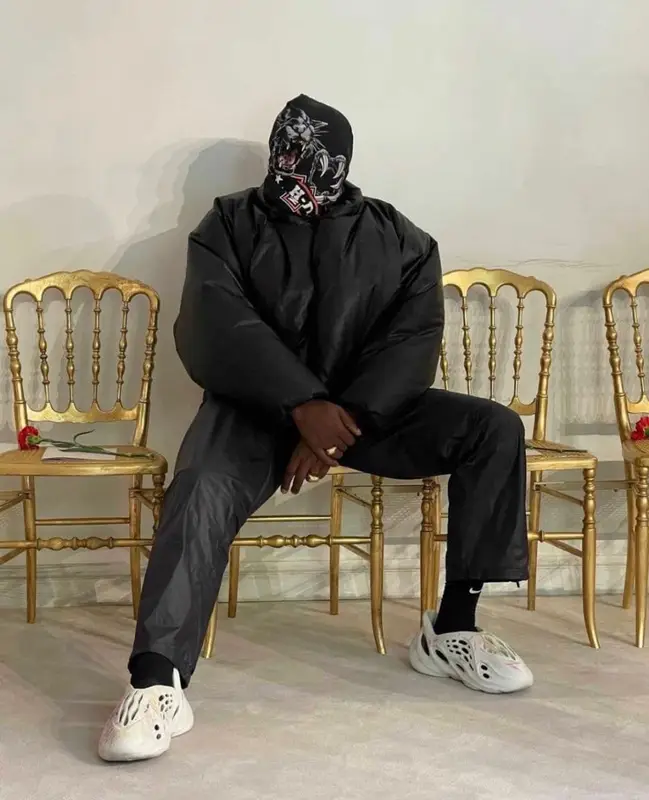 Kanye West outfit in Yeezy, Montbell, and GAP, 2021