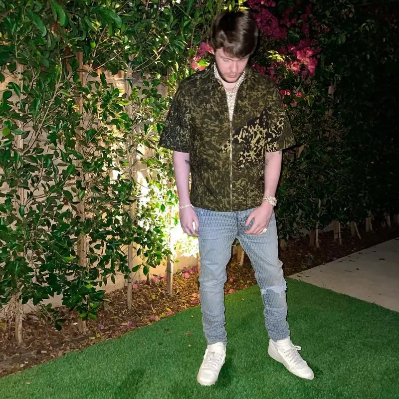 Murda Beatz outfit in Givenchy, Amiri, and Playboy, 2021