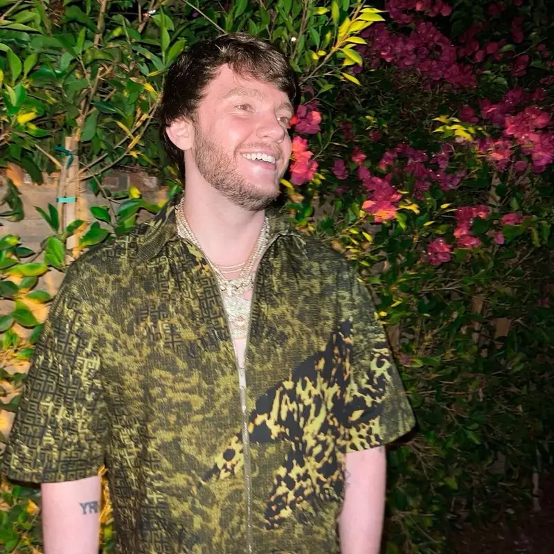 Murda Beatz outfit in Givenchy, Amiri, and Playboy, 2021
