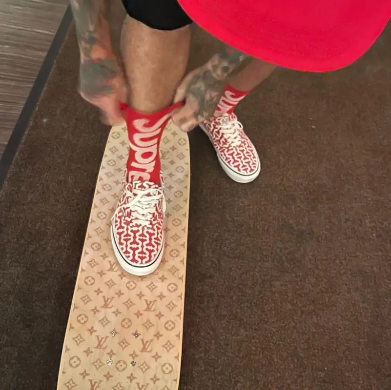 J Balvin outfit in Nike, Louis Vuitton, and Supreme, 2021