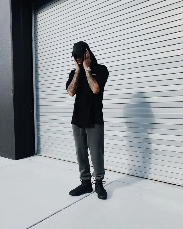 Rauw Alejandro outfit in Balenciaga, 1017 Alyx 9SM, and Nike, 2021