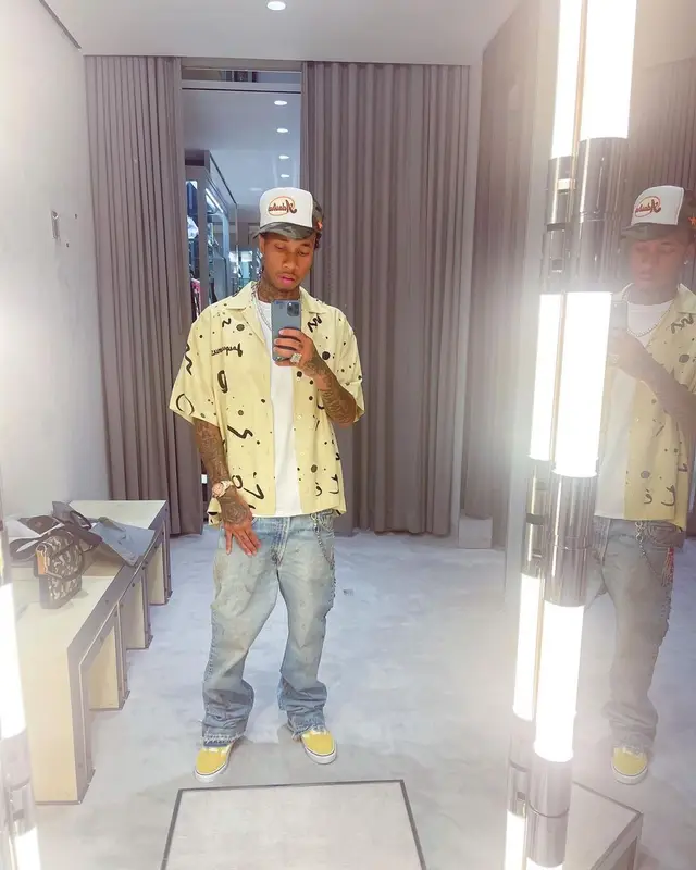 Tyga outfit in Jacquemus, Vans, and Adastra LA, 2021