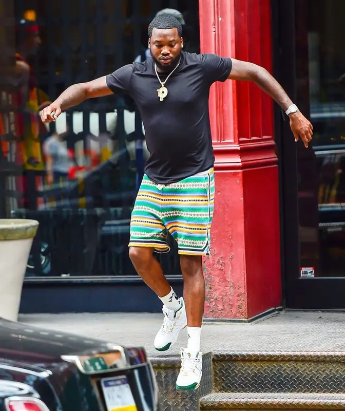 Meek Mill outfit in John Elliott, Nike, and Bape, 2021