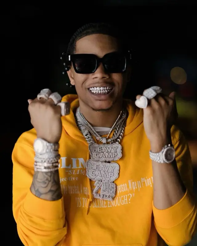 Lil Migo outfit in Purple Brand, Dior, and Off-White, 2021