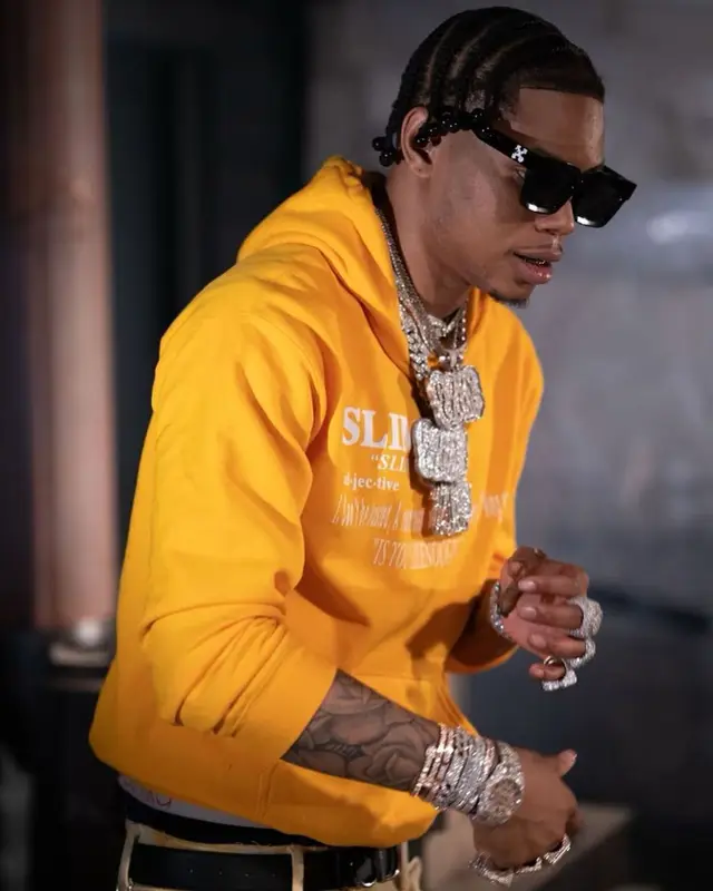 Lil Migo outfit in Purple Brand, Dior, and Off-White, 2021