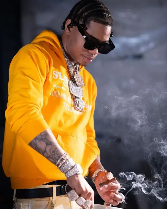 Lil Migo outfit in Purple Brand, Dior, and Off-White, 2021