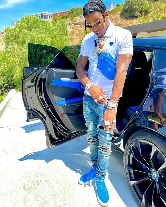 CJ So Cool outfit in Versace, Amiri, and Louis Vuitton, 2021