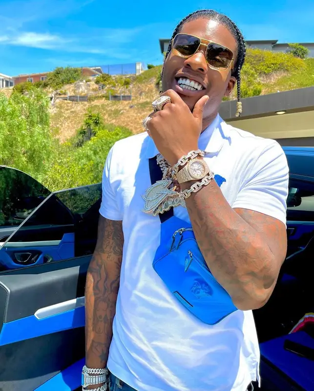 CJ So Cool outfit in Versace, Amiri, and Louis Vuitton, 2021