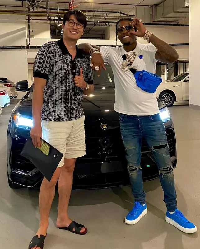 CJ So Cool outfit in Versace, Amiri, and Louis Vuitton, 2021