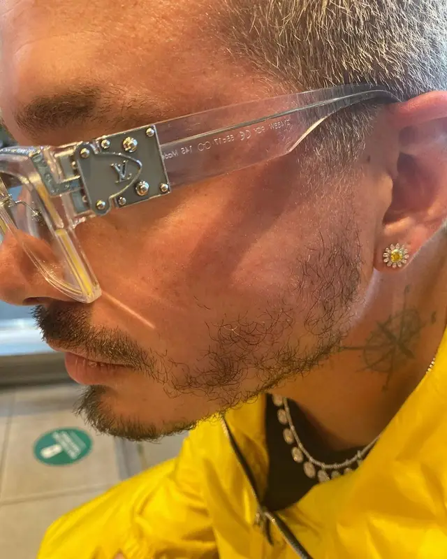 J Balvin outfit in Prada, Nike, and Louis Vuitton, 2021