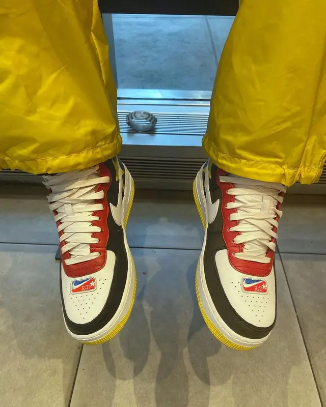 J Balvin outfit in Prada, Nike, and Louis Vuitton, 2021