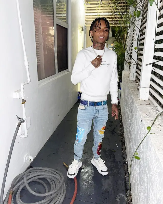 Swae Lee outfit in Off-White, Amiri, and Louis Vuitton, 2021